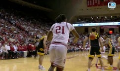 Indiana's Mackenzie Mgbako throws an inbounds pass off an Iowa player's back, picks it up and scores